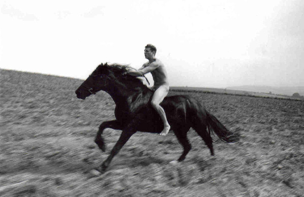 Man on Horse by Ari Ashley.